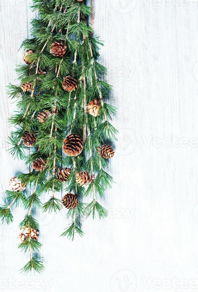 New Year or New Year's Eve background with fir branch with cones. The year 2023 is coming. photo