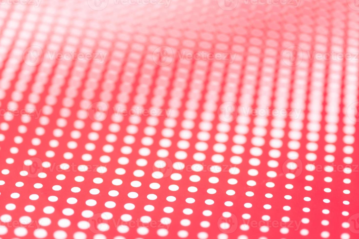 Red and white abstract background. Halftone pattern paper design. Selective focus photo