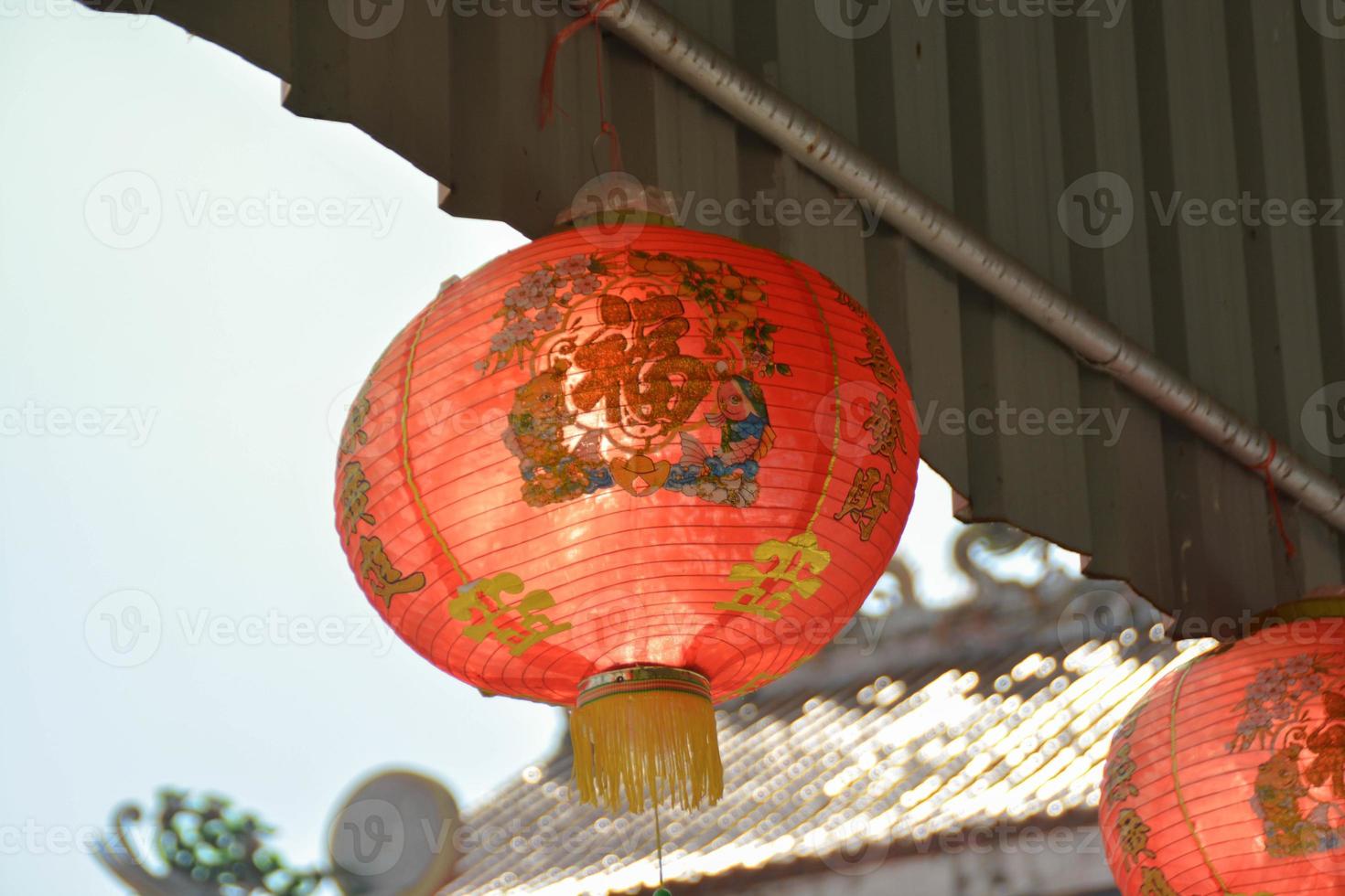 Chinese red lantern has written lucky and chinese pattern, decoration hanging celebrate for chinese new year. photo