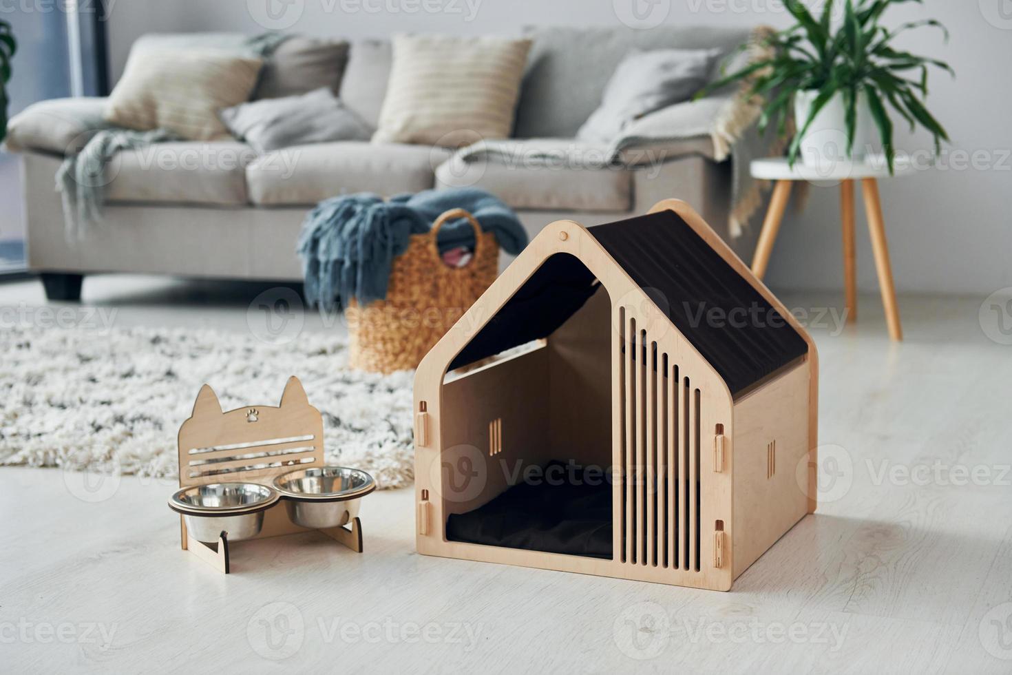 Little pet booth is on the floor in modern domestic room photo