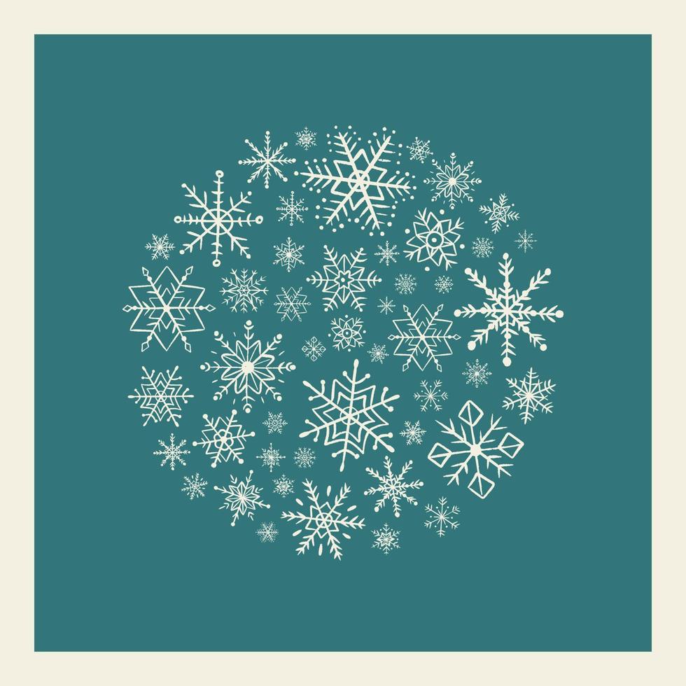 colección de copos de nieve dibujados a mano aislados sobre fondo azul. bola de navidad hecha de copos de nieve en estilo garabato vector