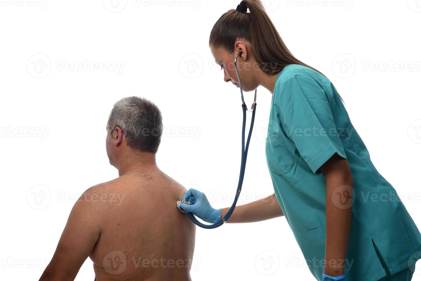 doctora revisando al paciente. concepto medico foto