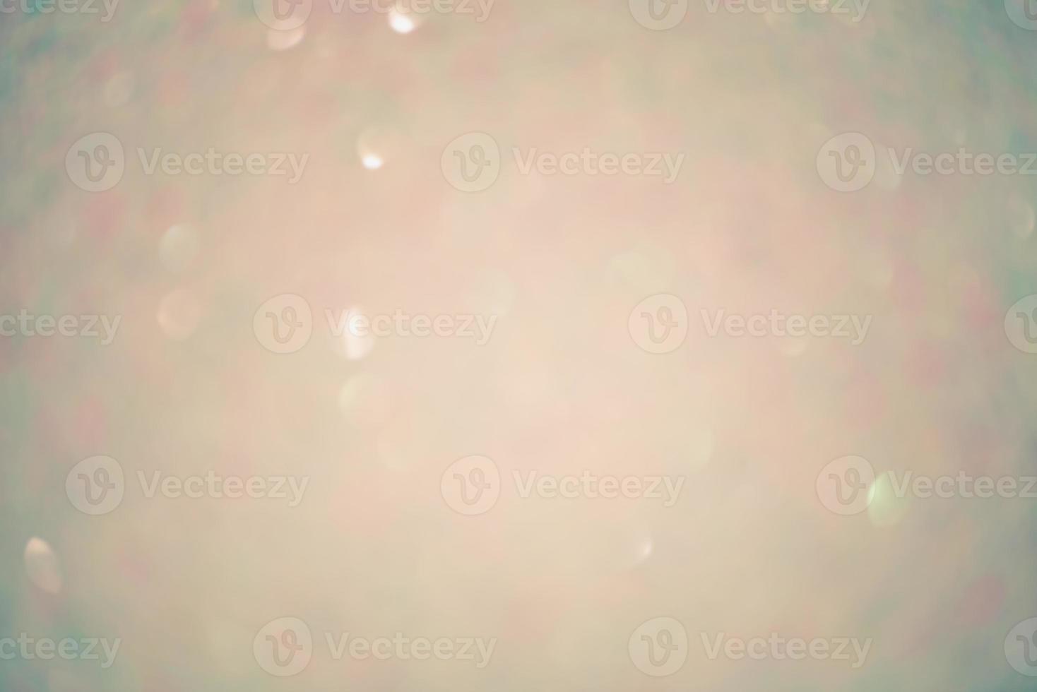 Beige background with light defocuses. Blurred background material for designers. photo