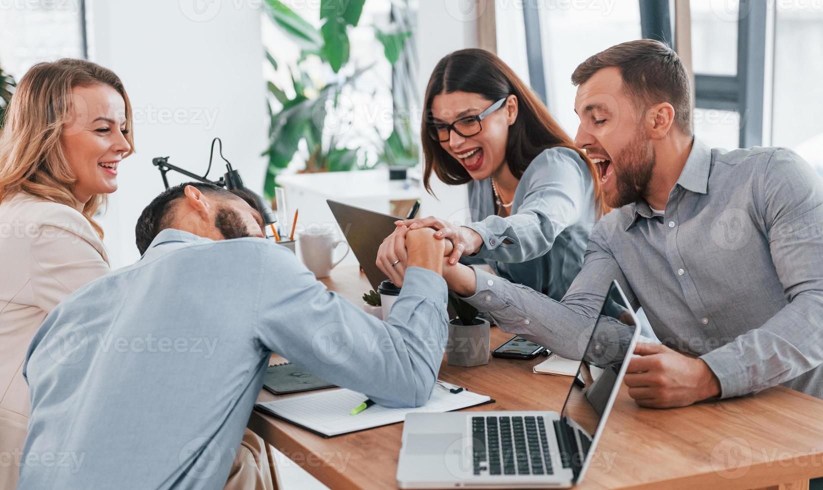 Modern office. Group of business people that working on the project photo