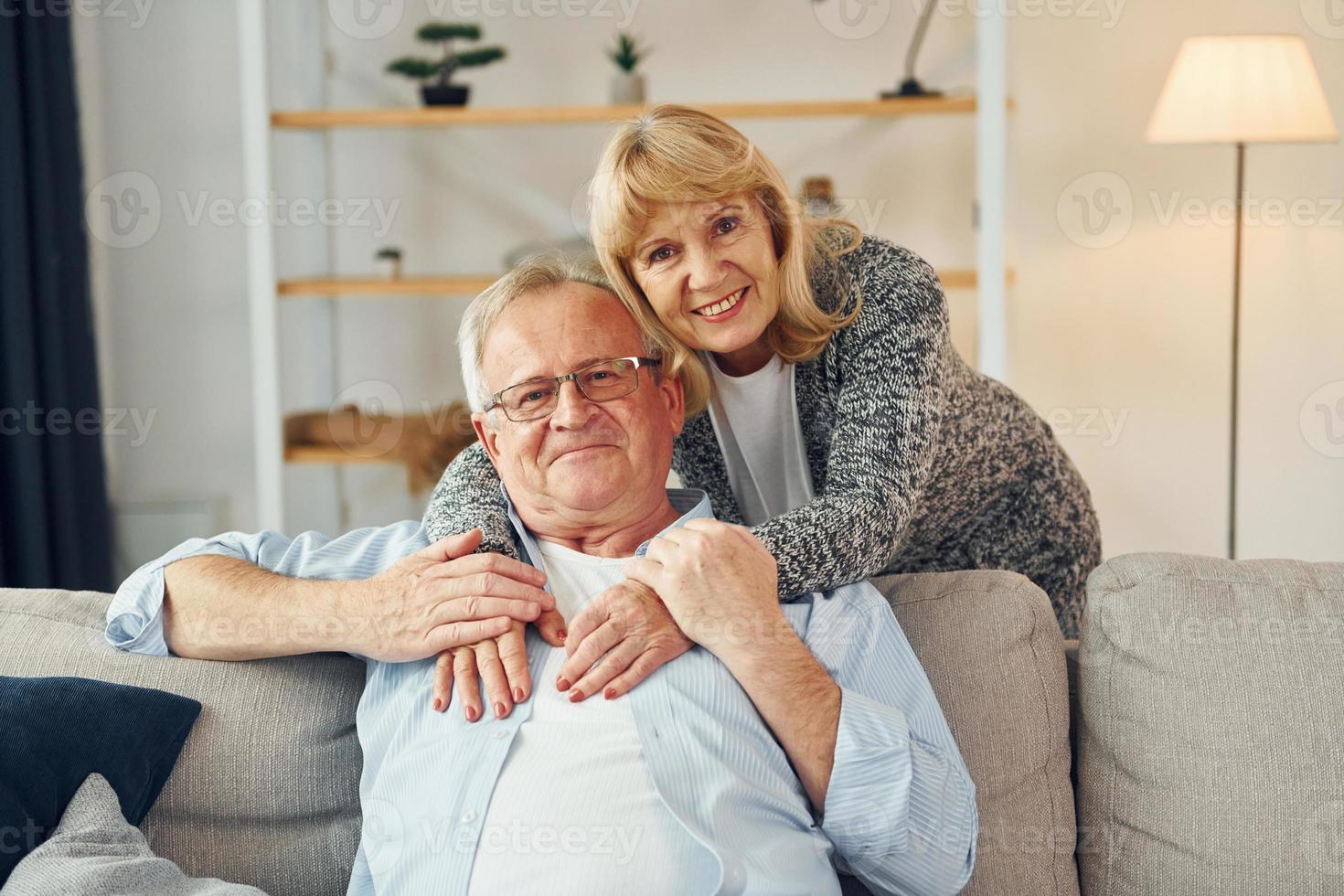 Happy together. Senior man and woman is at home photo