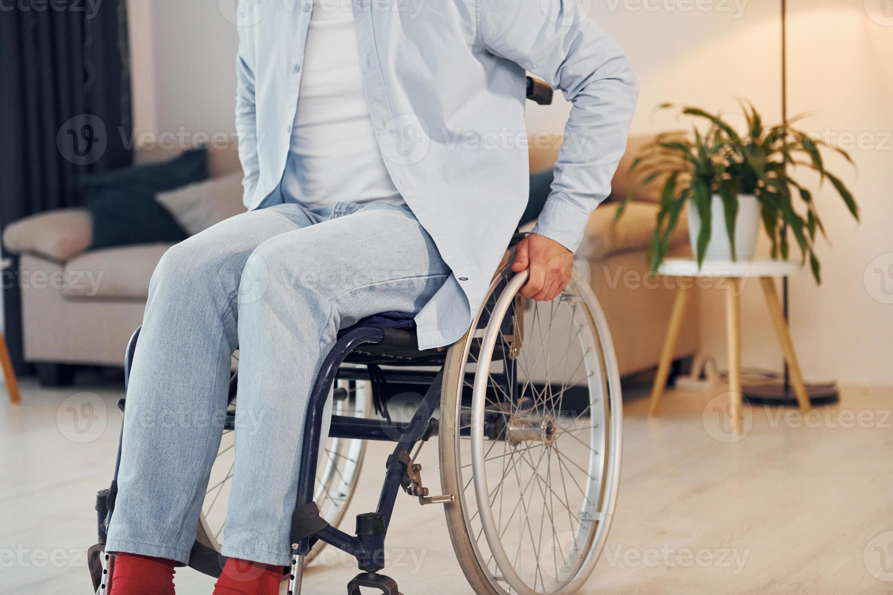 Close Up View Disabled Man In Wheelchair Is At Home 15412751 Stock close-up-view-disabled-man-in-wheelchair-is-at-home-15412751-stock