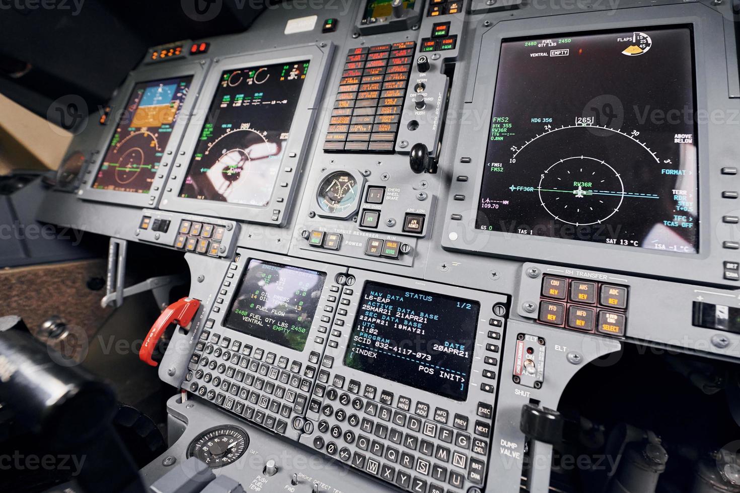 Different displays. Close up focused view of airplane cockpit photo