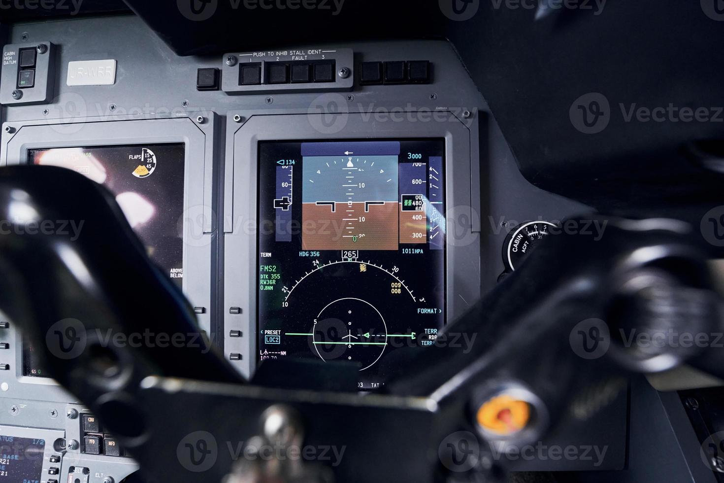 Close up focused view of airplane cockpit photo