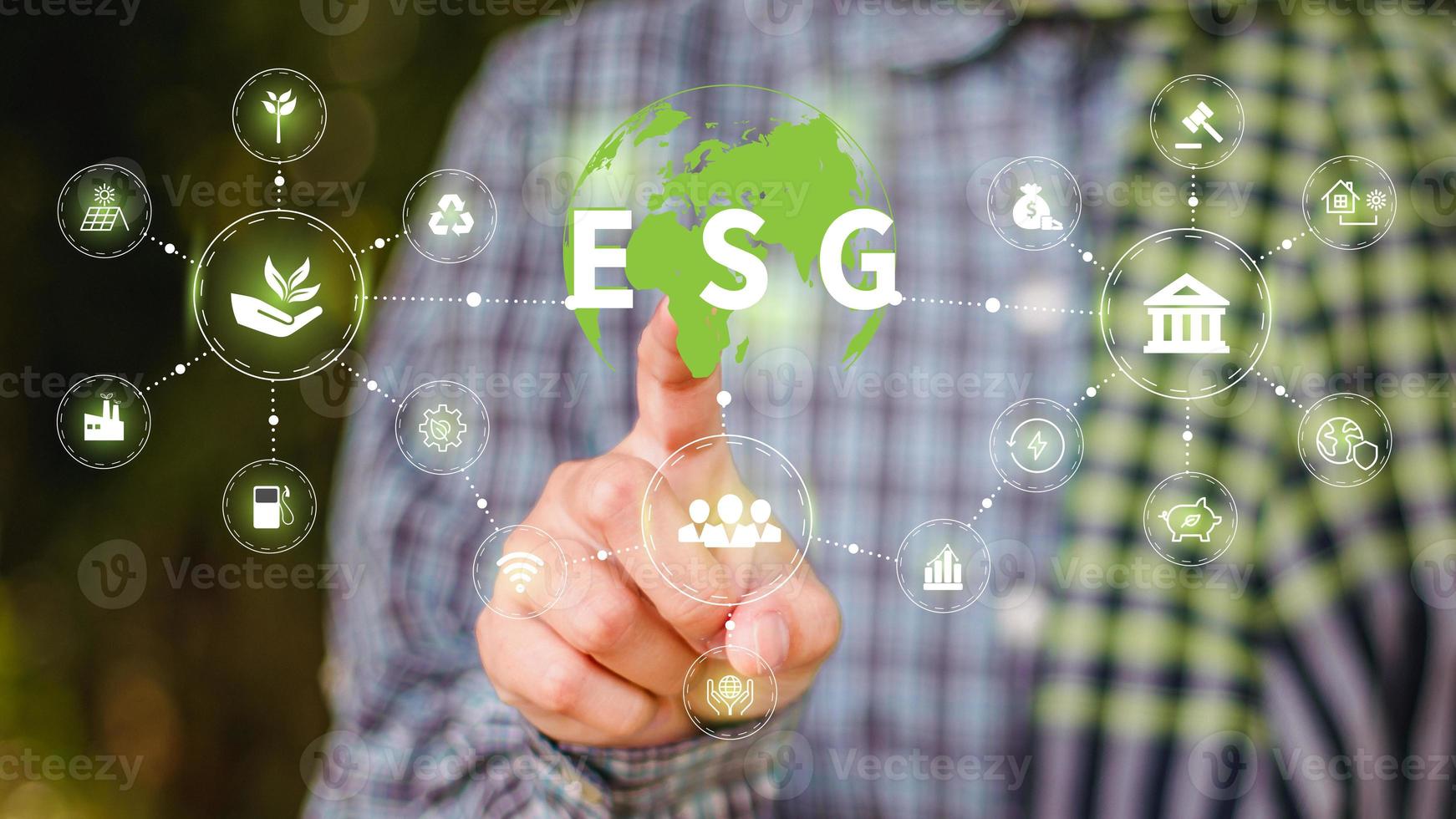 ESG icon concept in the hand for environmental social and governance in sustainable and ethical business on the Network connection photo