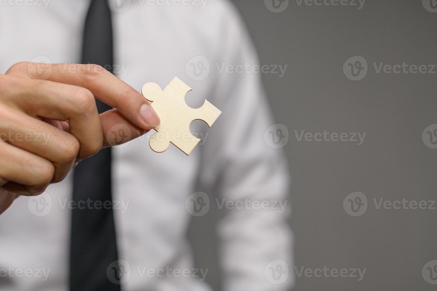 Business Find new solutions, success and strategy connecting assembling jigsaw puzzle photo