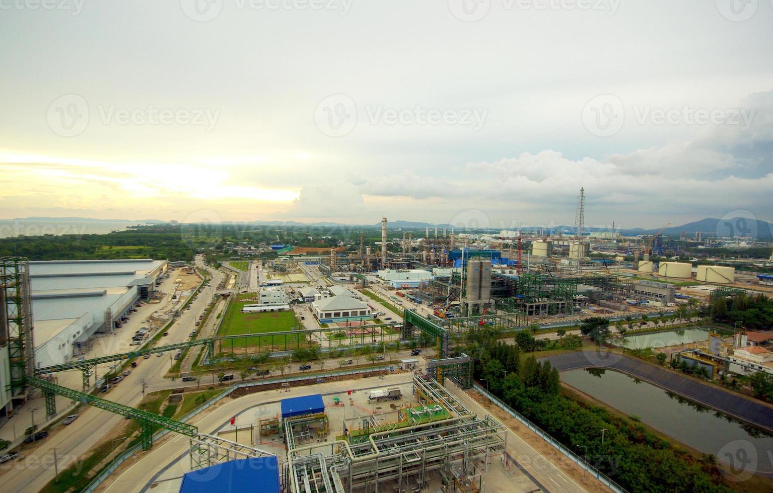 The under construction Large industrial plant site in evening light photo