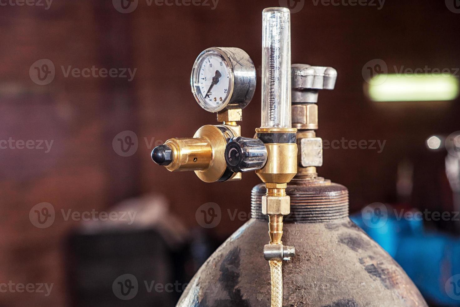 Close-up of a metal gas cylinder photo