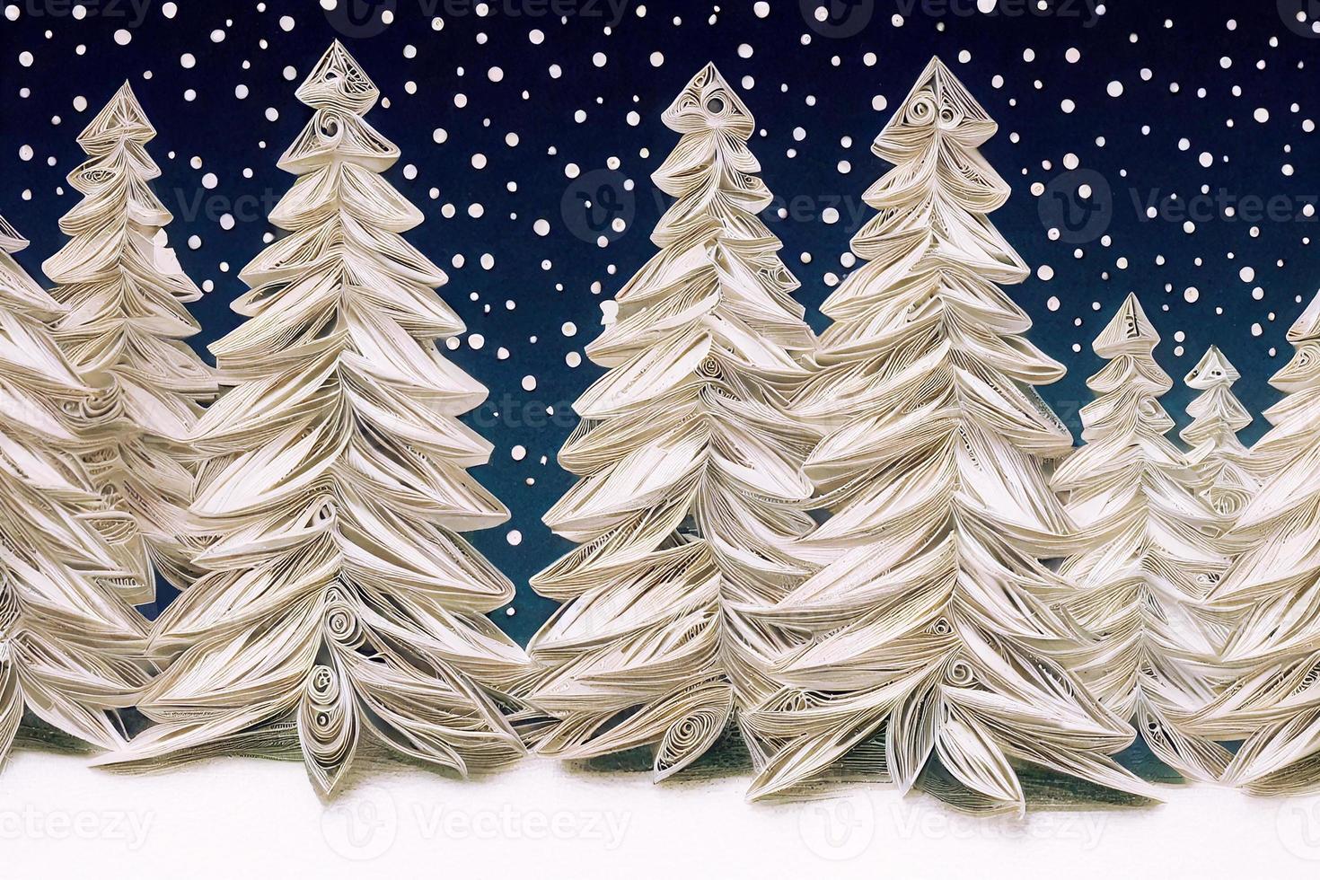 paper quilling winter landscape of white christmas trees and snow photo