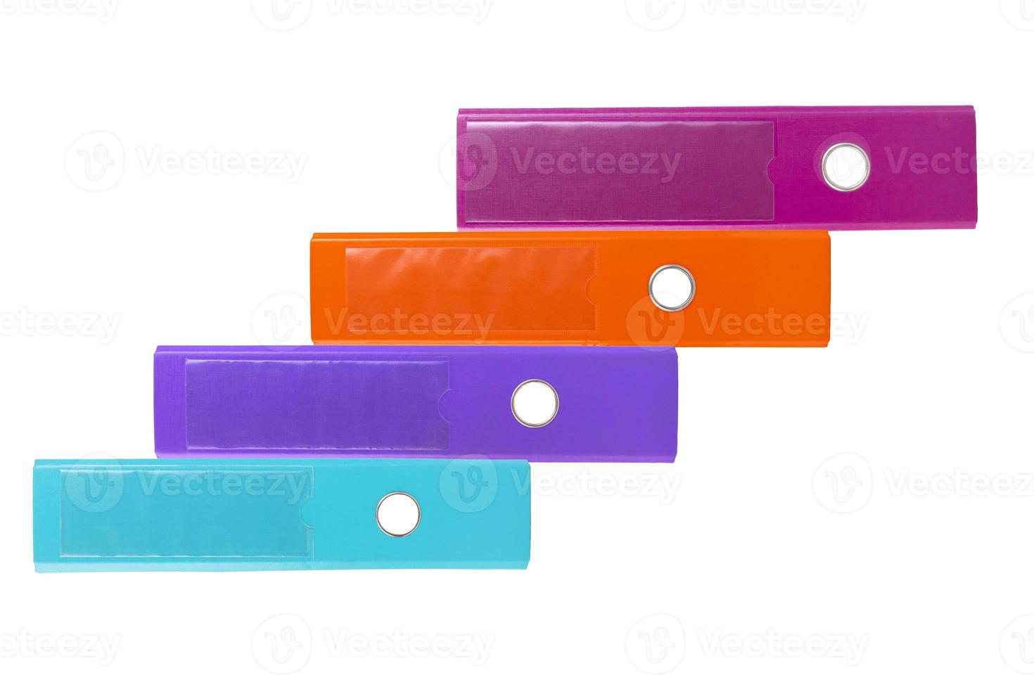 Office folders stacked with a ladder, set of four in different colors. White isolated background. copy space. photo