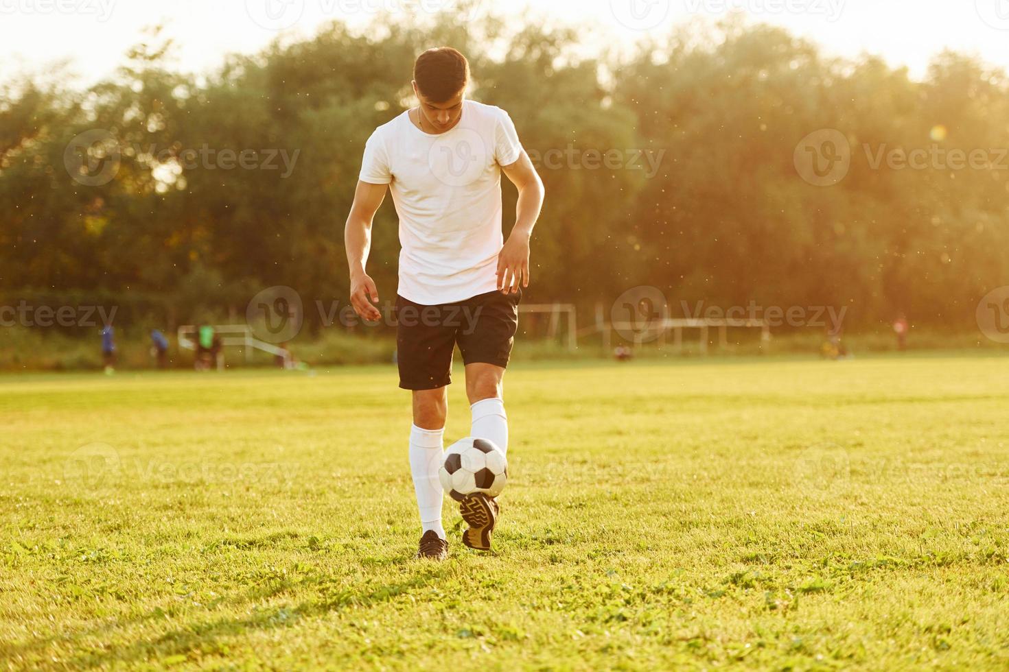 One person only. Young soccer player have training on the sportive