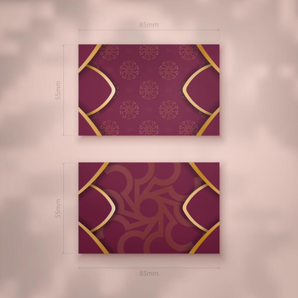 Burgundy business card with vintage gold ornaments for your brand. vector