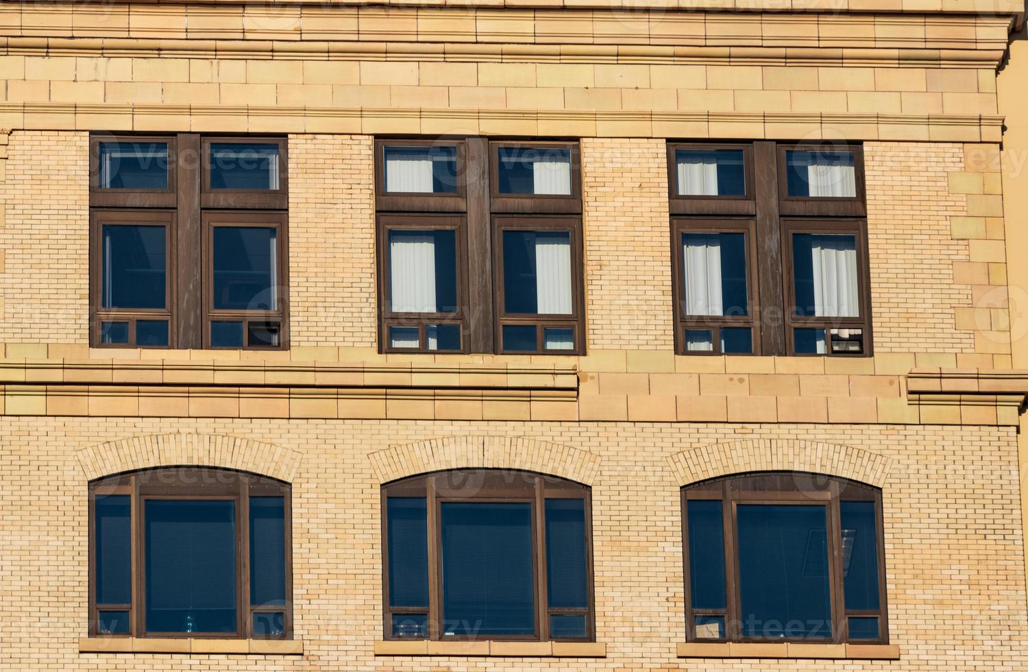 Abstract building wall with windows photo