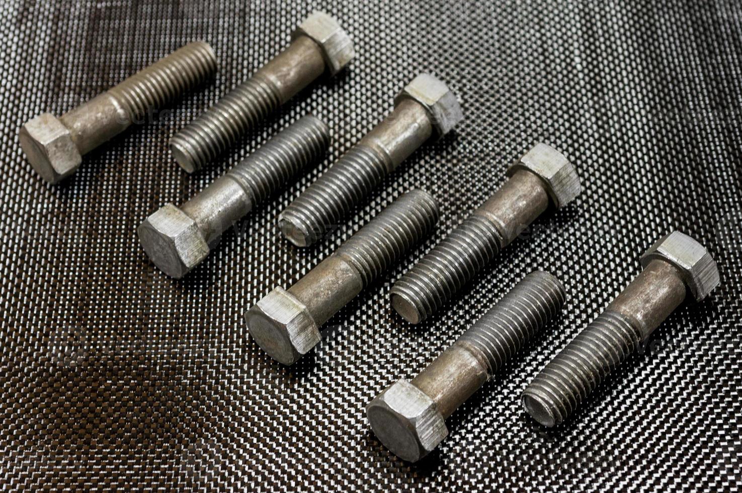 USS shanked bolts on carbon fiber photo