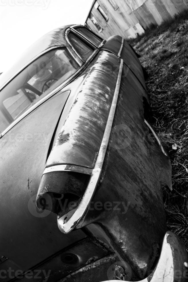 Antique vintage american automobile with a broken tail light photo