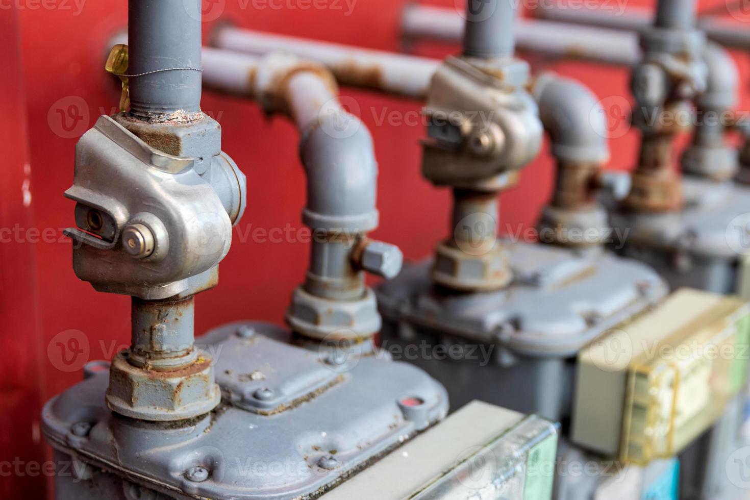 Abstract building power and gas meters with pipes photo