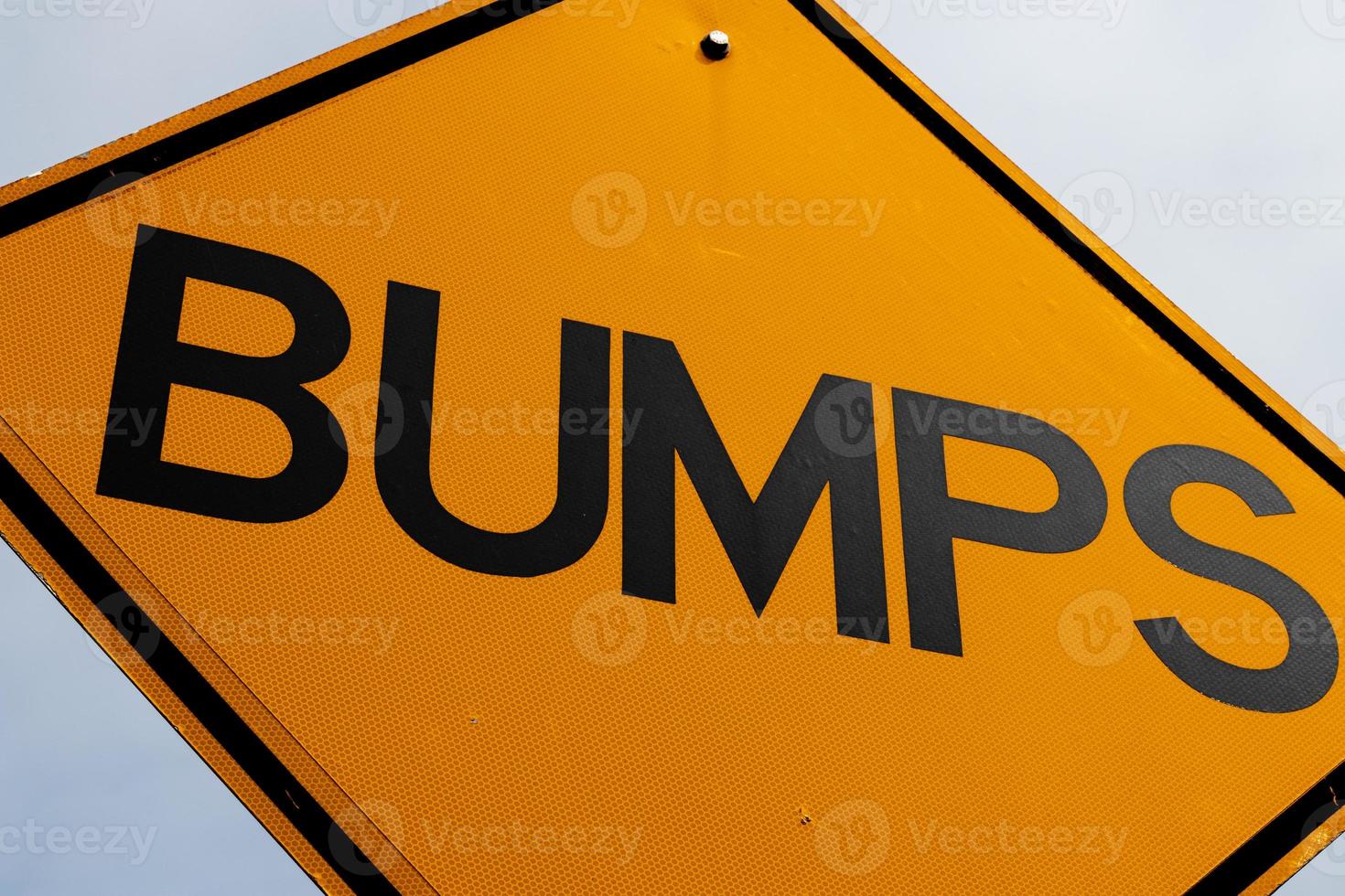 Abstract bumps road sign close up photo