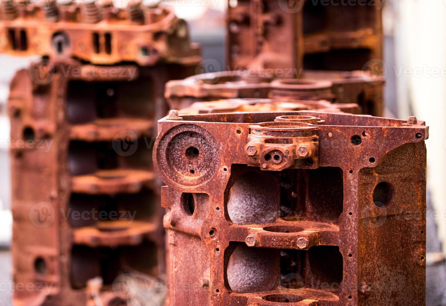 Rusty dismantled engine blocks photo