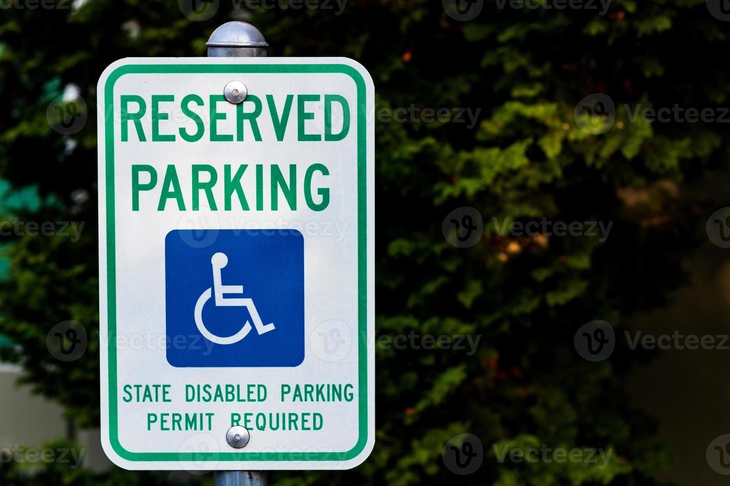Reserved handicapped permit parking only sign photo