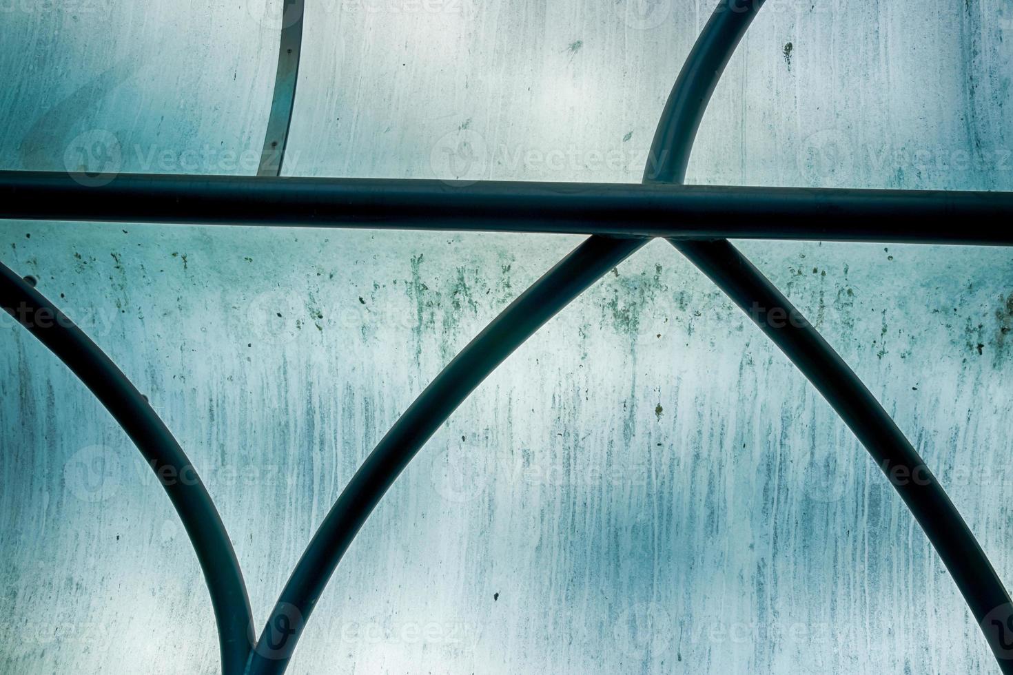 Abstract building window glass with iron bars photo