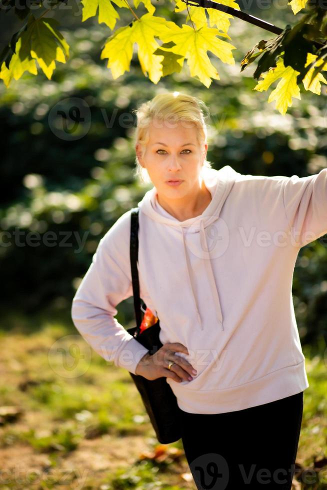 Pretty woman under a tree photo