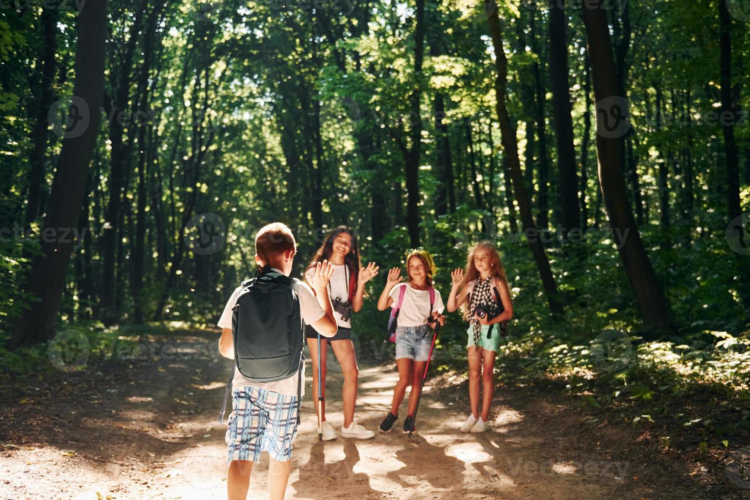 Beautiful nature. Kids strolling in the forest with travel equipment ...