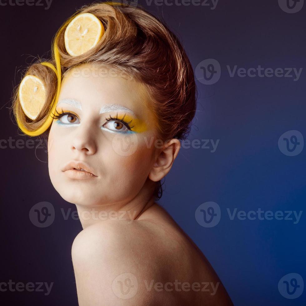 woman with fruit in hair photo