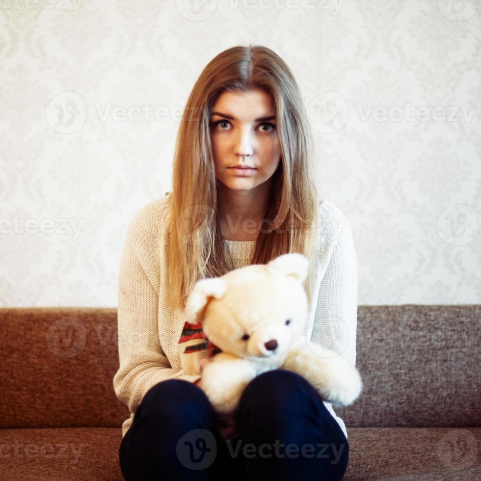 Beautiful blonde with white bear photo
