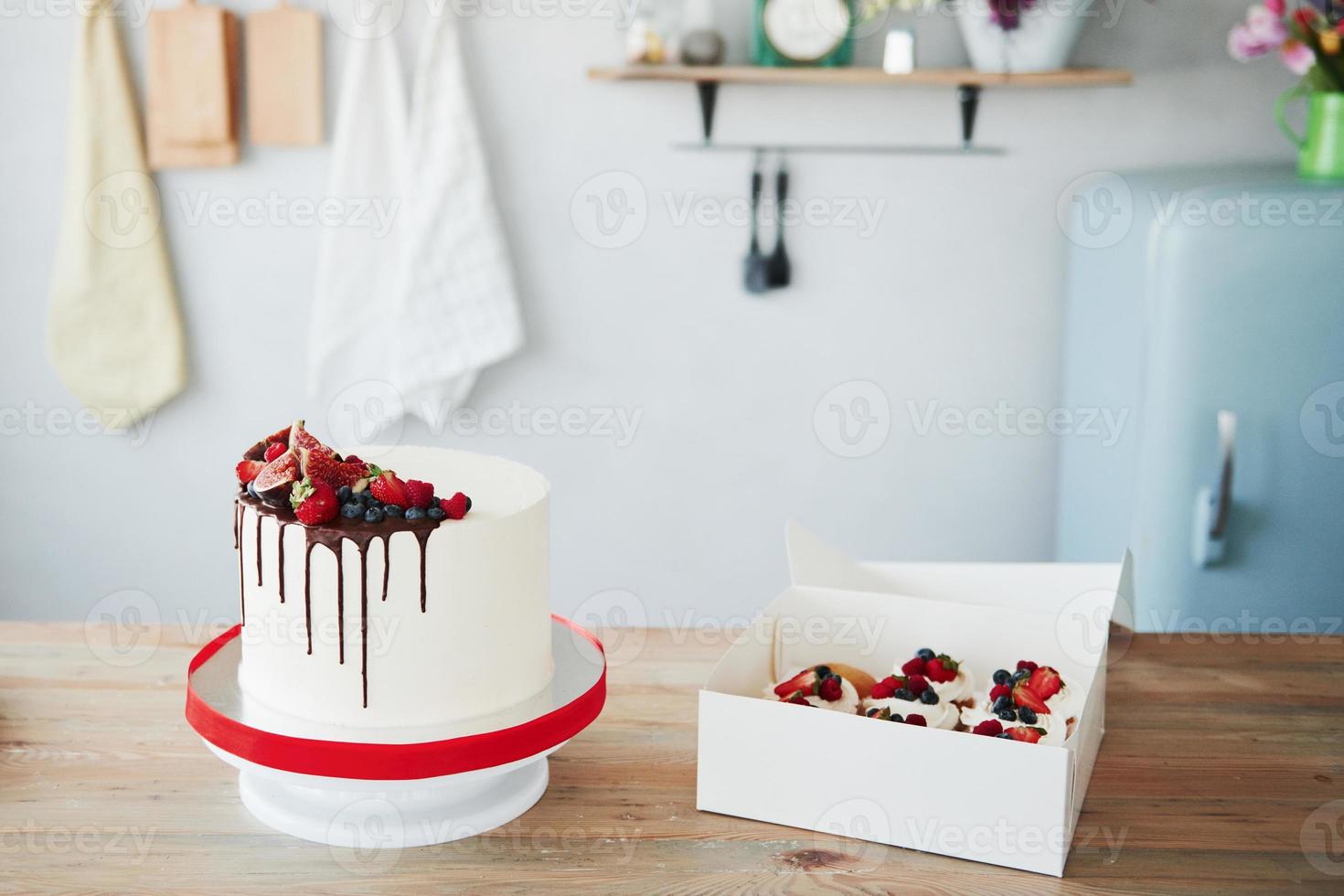 Homemade pie with cherry and chocolate on it indoors at kitchen photo