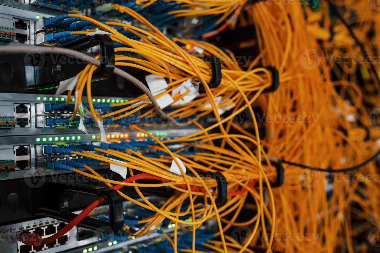 Close up view of internet equipment and cables in the server room photo