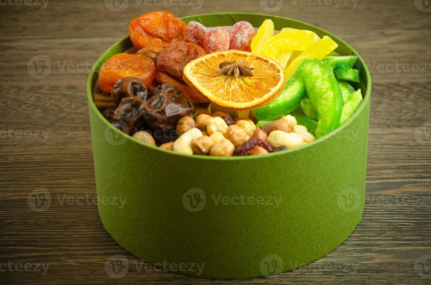 in the box nuts, dried fruits and candied fruits, a useful gift photo