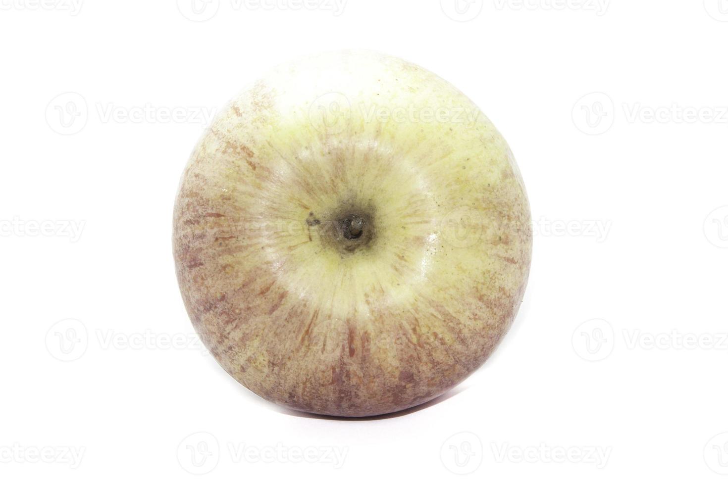 An apple on a white background shot in a studio in my house photo