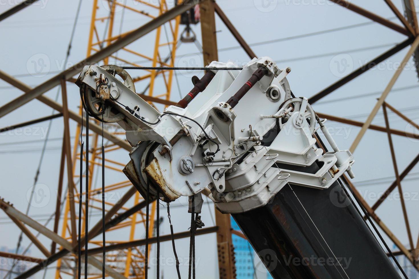 A hook is a tool used to help lift loads by hooking them up. photo