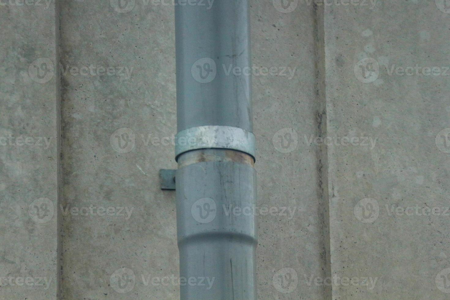 PVC pipe connection on the drainage of a bridge. photo