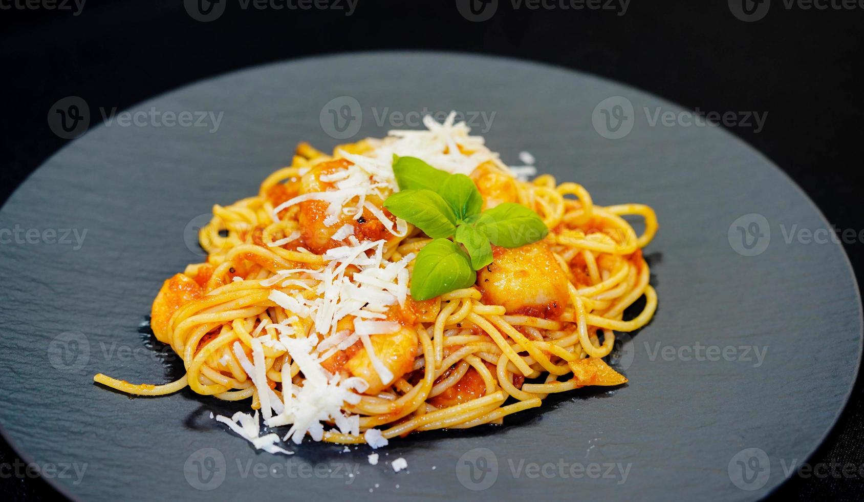 Spaghetti Rigate - italian pasta with scallops and shrimps photo