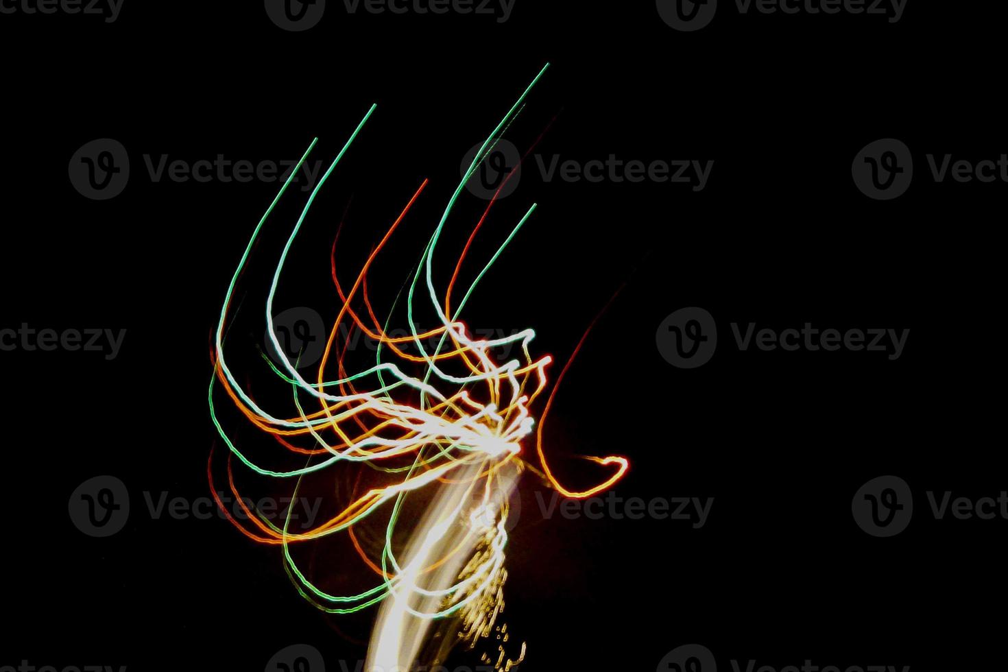 exploding lights with a black background photo