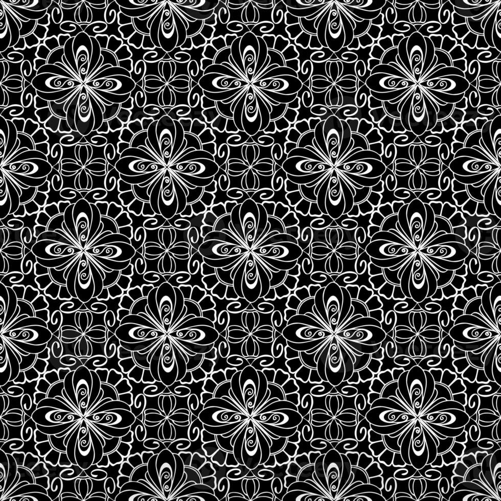 seamless graphic pattern, floral white ornament tile on black background, texture, design photo