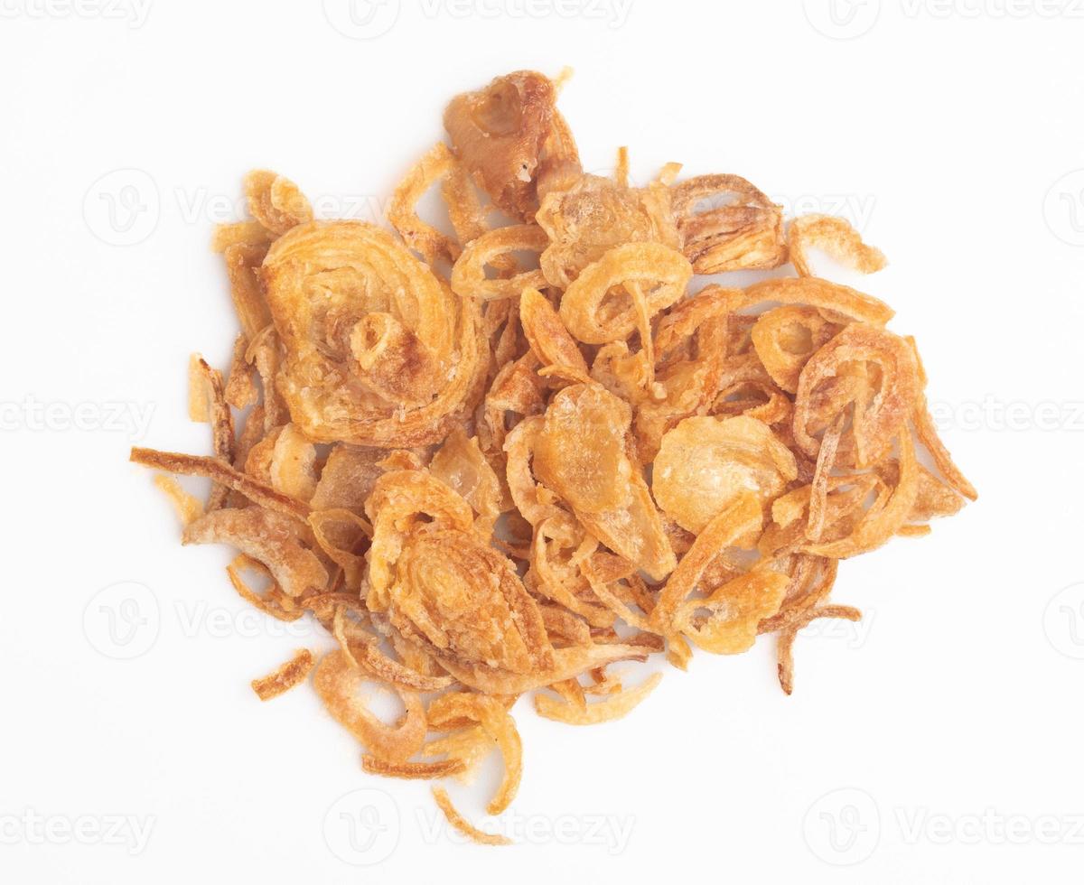 Crispy fried onion slices on a white background photo