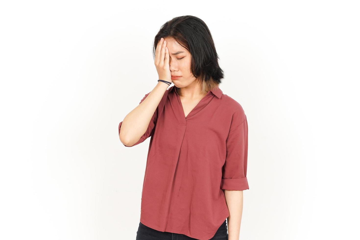 Headache Gesture Of Beautiful Asian Woman Isolated On White Background photo