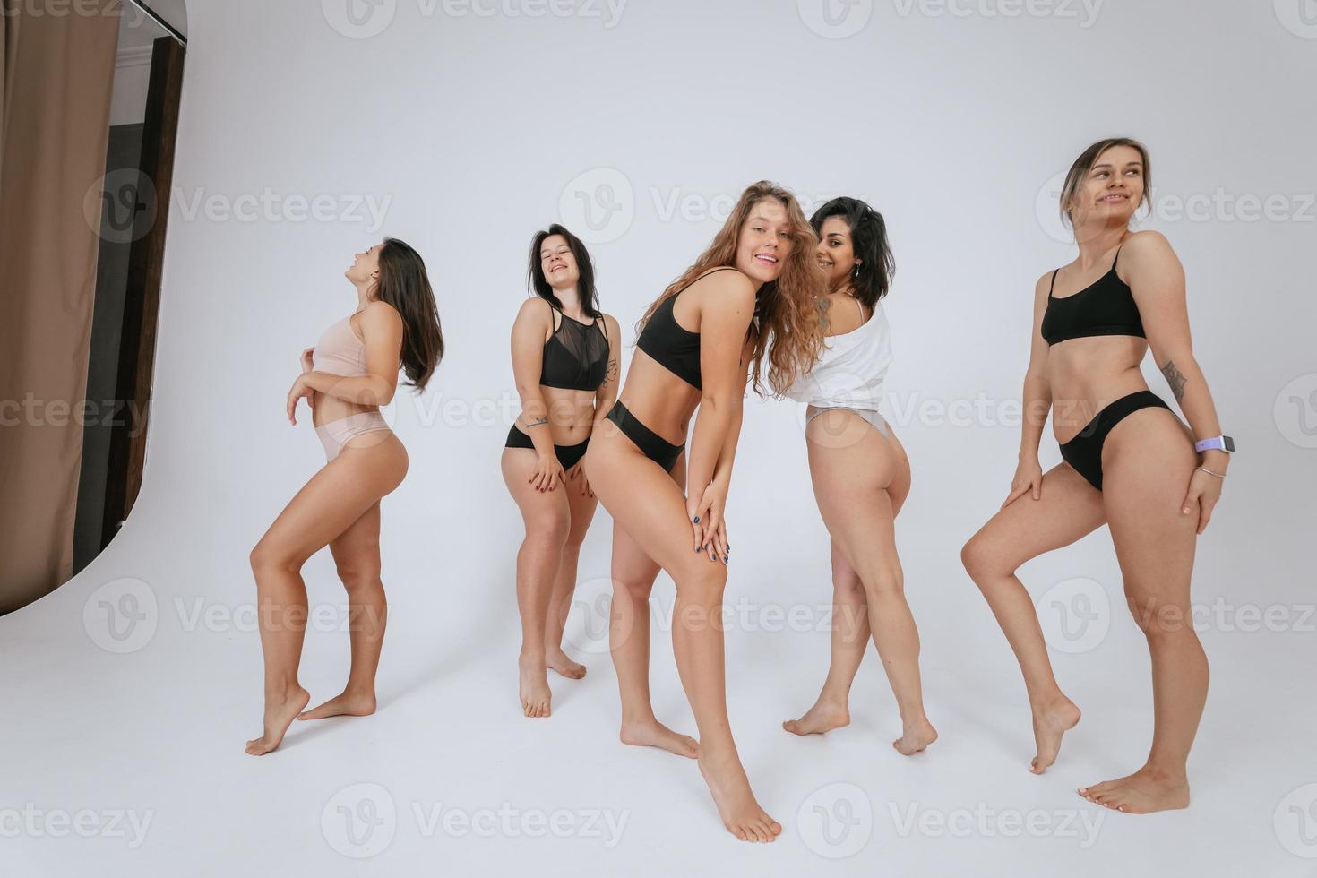 diverse models wearing comfortable underwear, enjoying time together photo