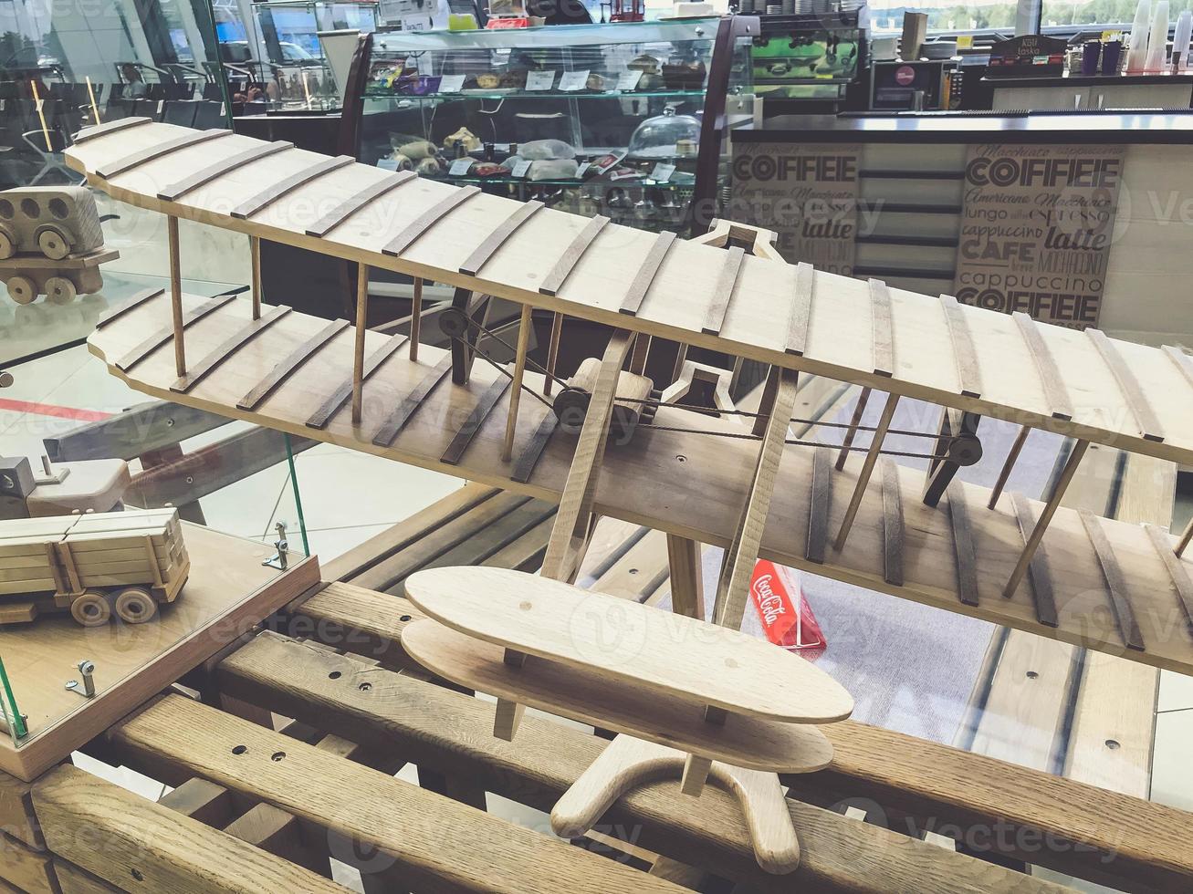 model airplane made of wood. aircraft transport from improvised materials. toy for children, vehicle model. fenders with wooden slats photo