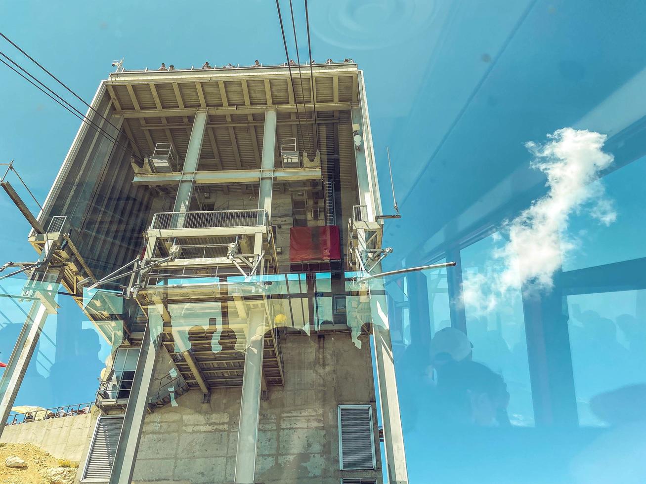 cable car on the mountain. a building for boarding tourists in the cabin before the tour. observation deck on the mountain, observation of nature photo