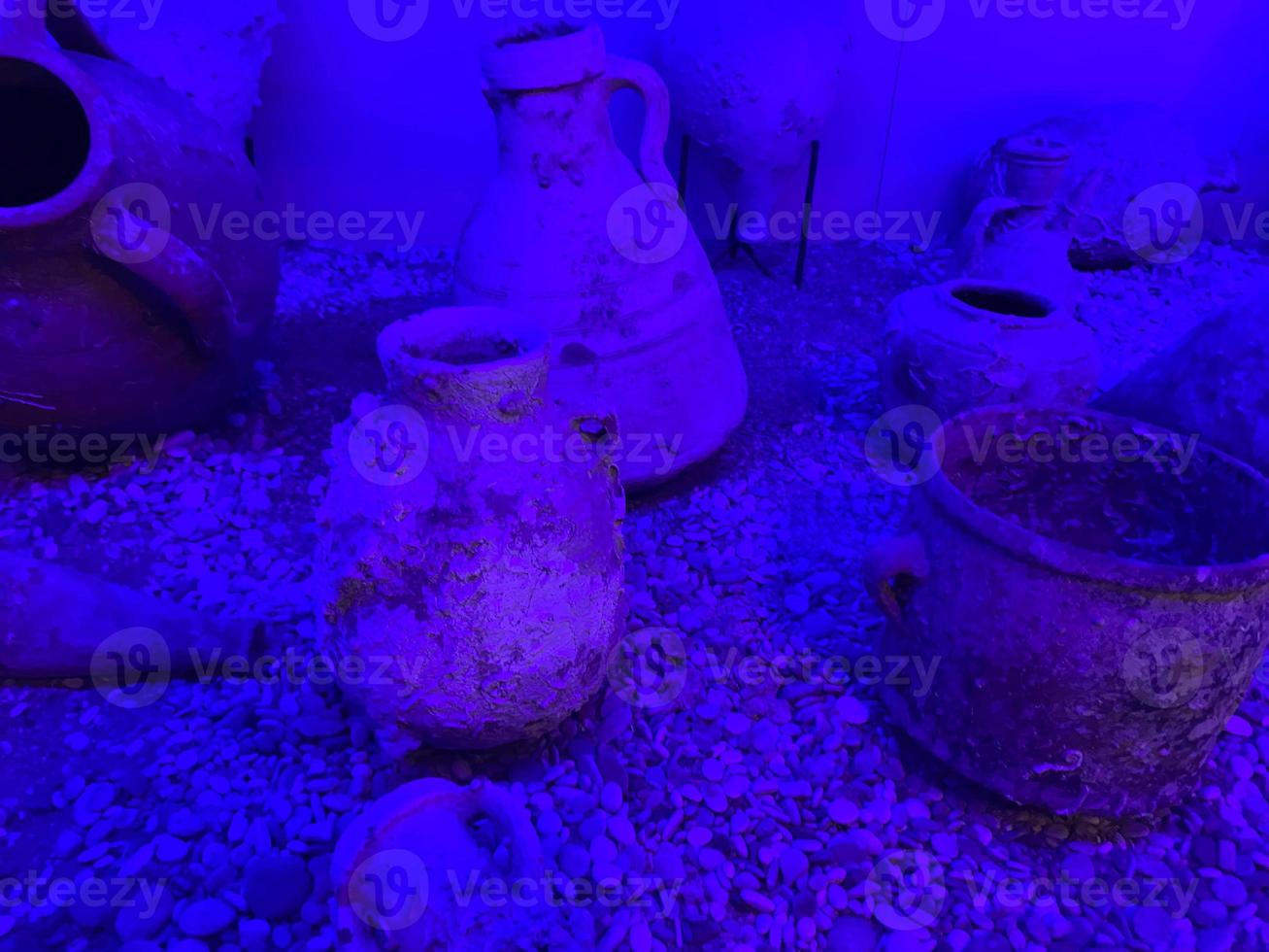 Decorative under water tank with broken jar photo