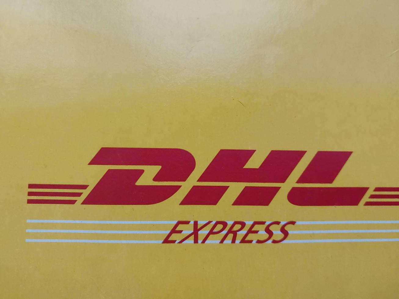 KIEV, UKRAINE - DECEMBER 10, 2022 Mail envelope service DHL photo