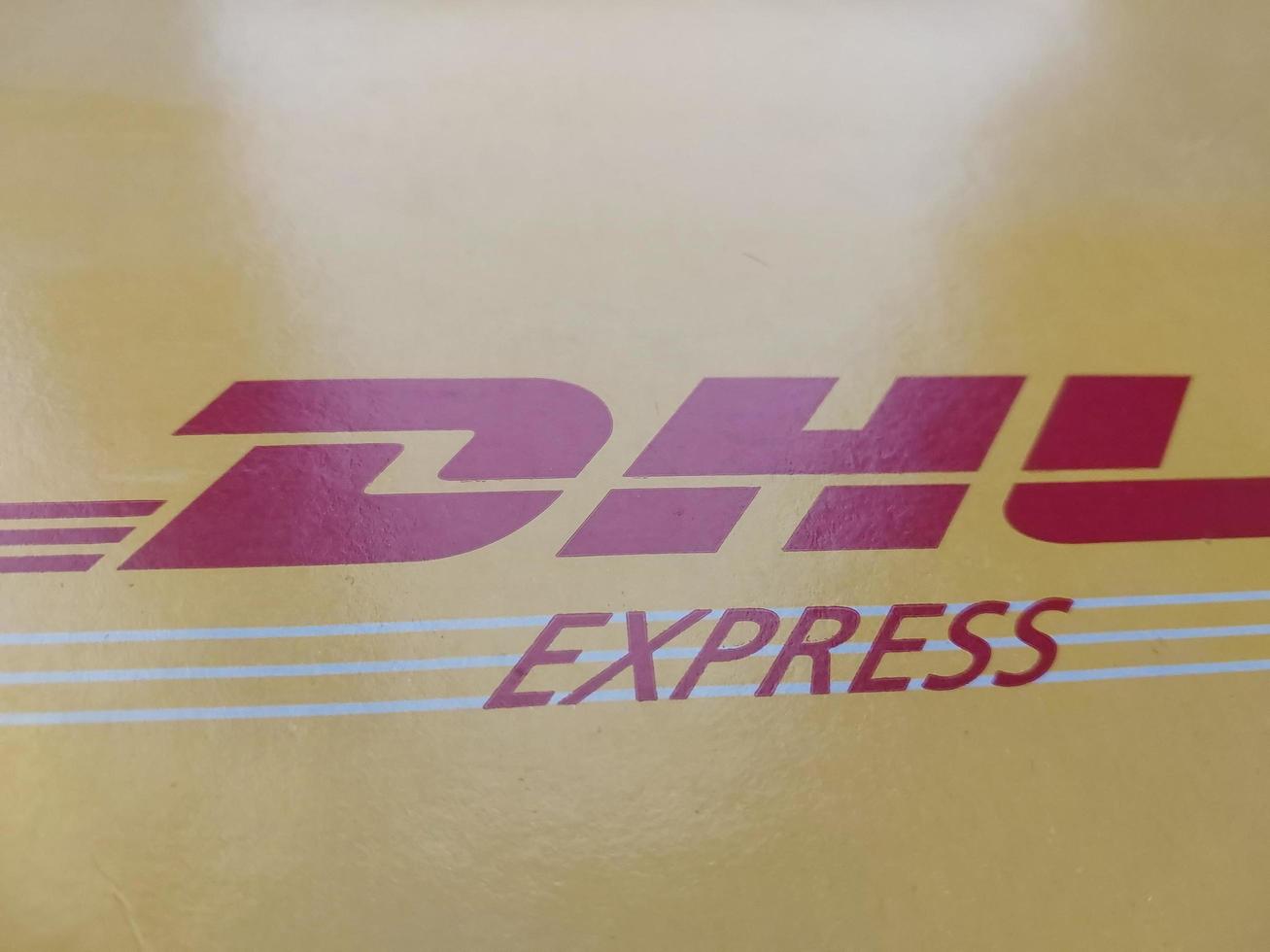 KIEV, UKRAINE - DECEMBER 10, 2022 Mail envelope service DHL photo