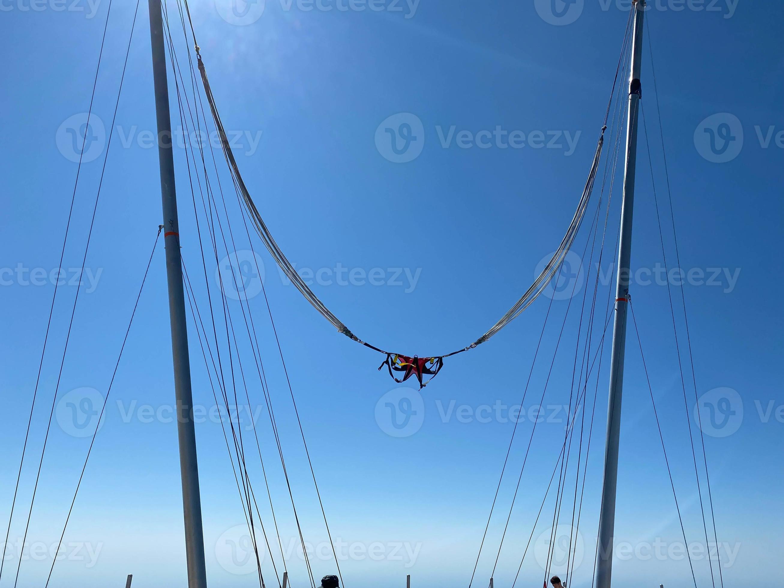 Extreme slingshot ride attraction in the city park 15539341 Stock Photo